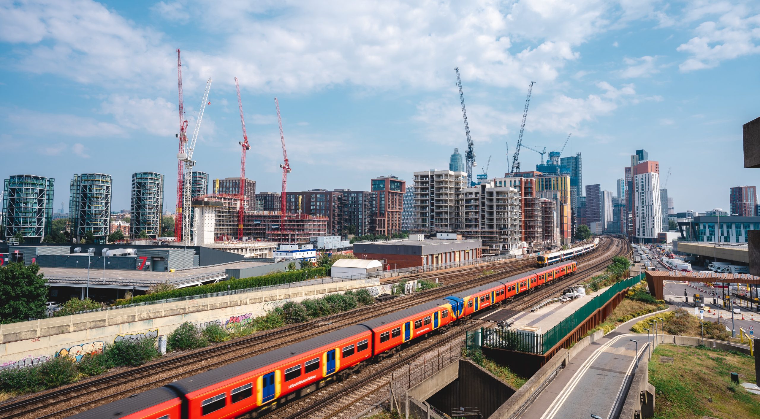 London / UK - 08/09/2020: Landscape view of trains going to Waterloo station at New Covent Garden Market.