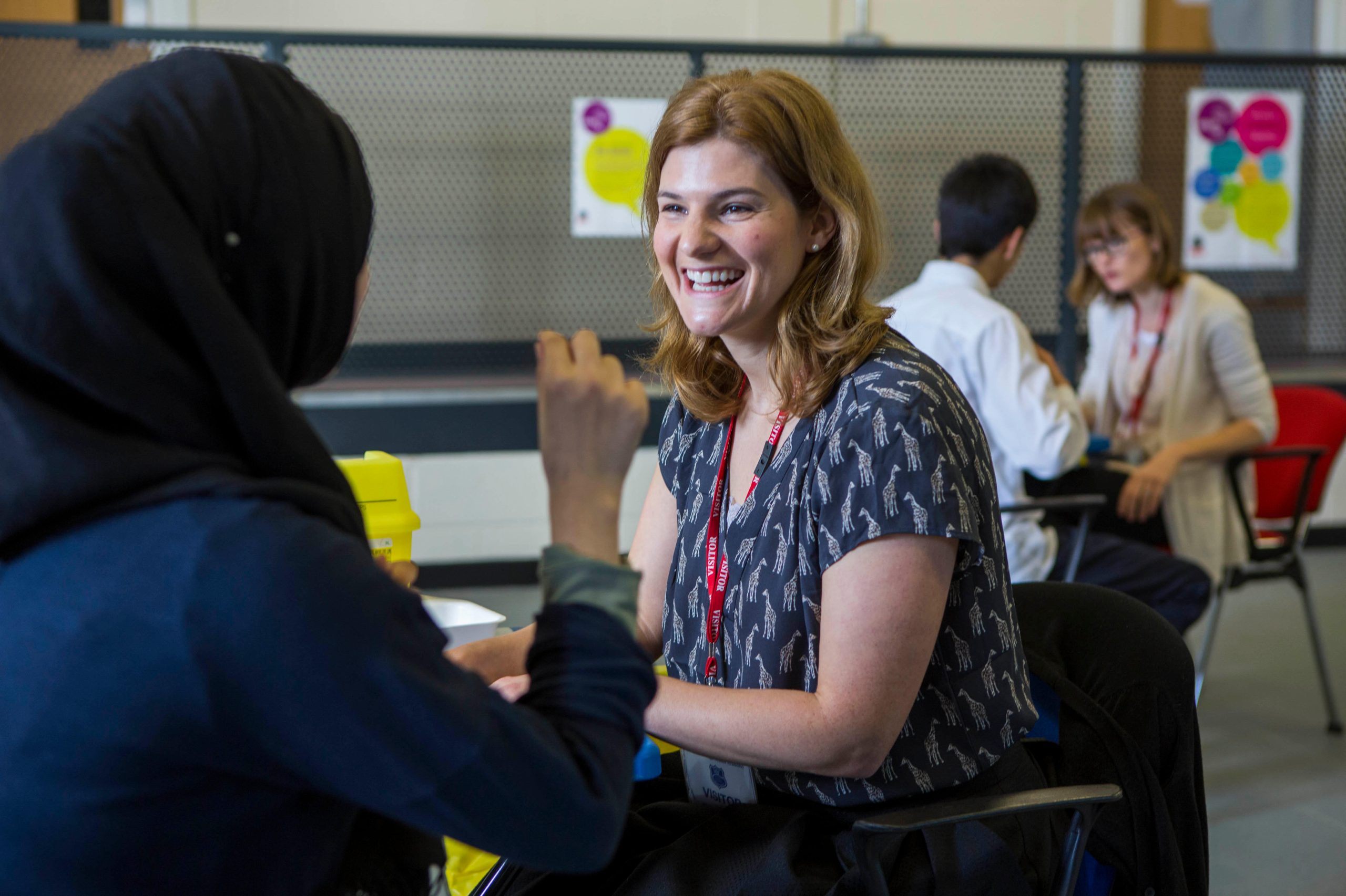 FF73M7 Sarah Murphy, TB Nurse Specialist for London TB Extended Contact Tracing (LTBEX) team, interviews a teenage girl who has had been identified as having contact with a case of infectious TB, so has been offered contact screening involving a health assessment and Mantoux skin test.  The contact tracing is being done in the school to increase uptake amongst the pupils. London, UK.