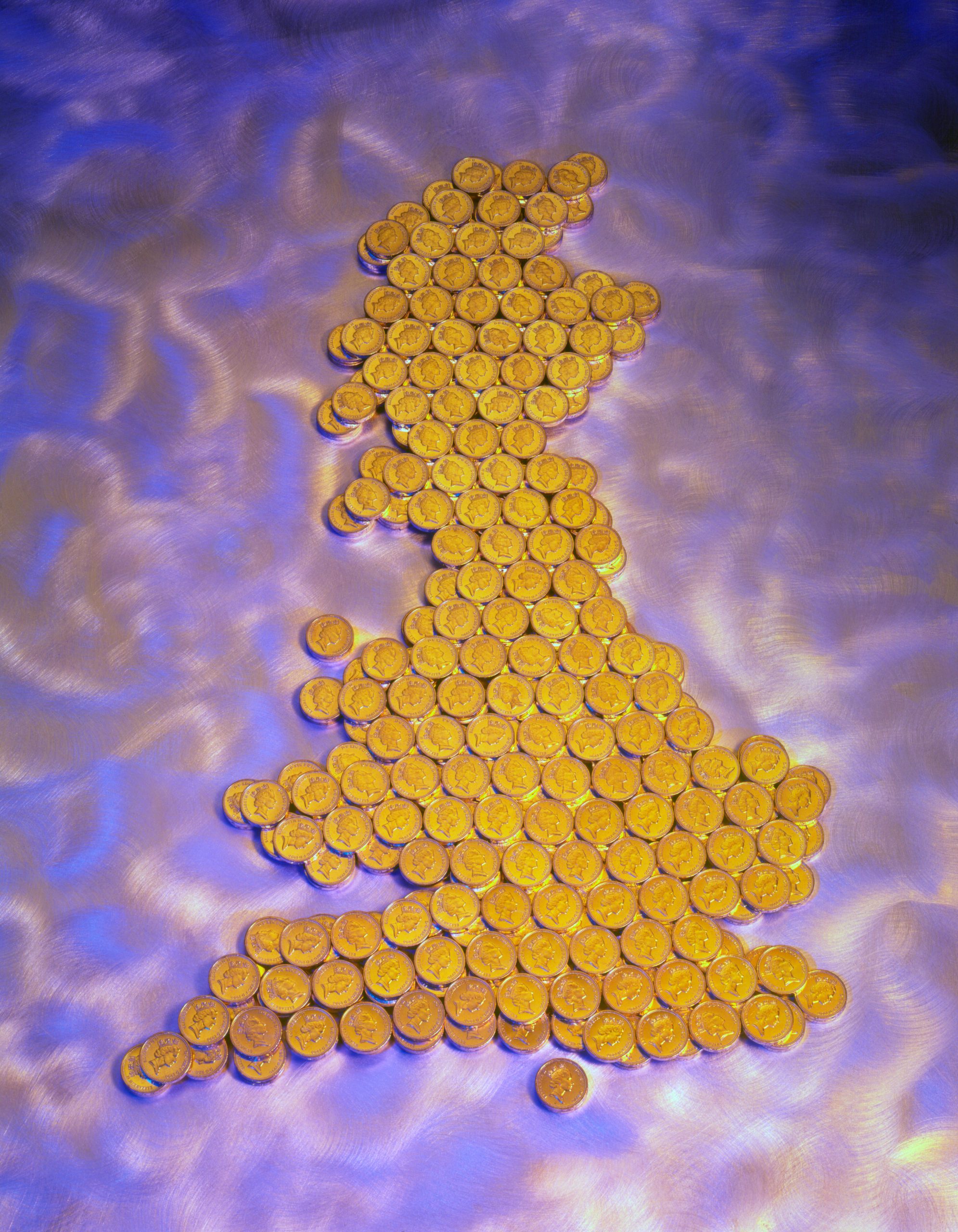 GF0AJY Pound coins in the shape of the British Isles, England, Wales and Scotland